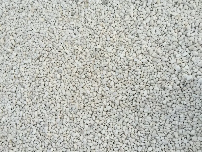 Close-up of grey granular fertilizer